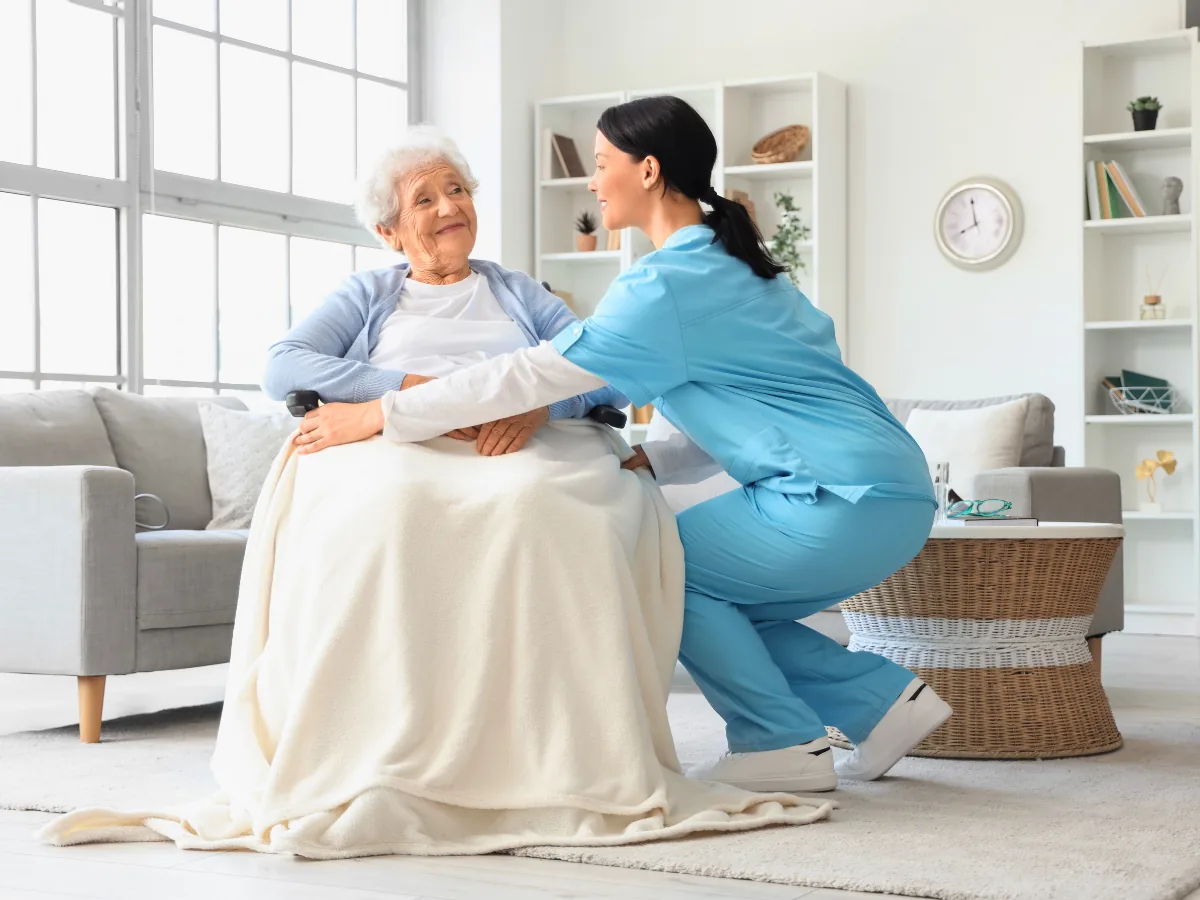Home health nurse caring for patient at home